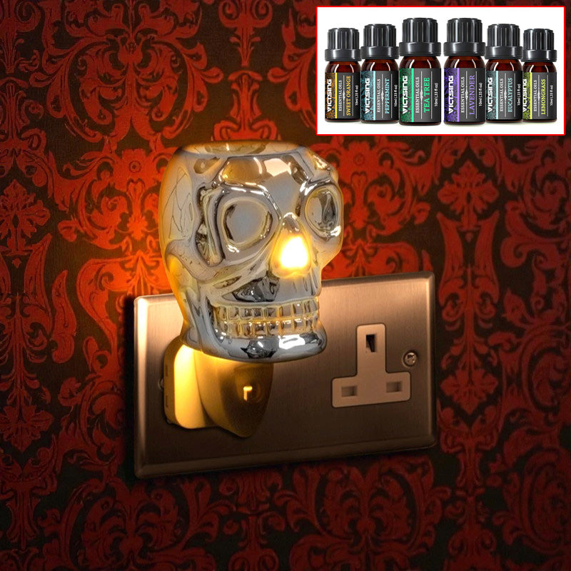 Silver Ceramic Skull Oil Burner and Wax Warmer Electric Plug-in Aroma Diffuser plus 6 Assorted Essential Oils