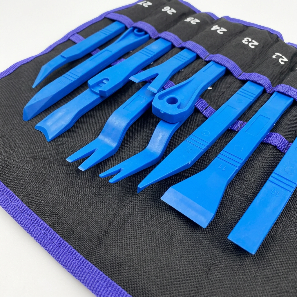 Close-up of blue forked and flat trim removal tool tips