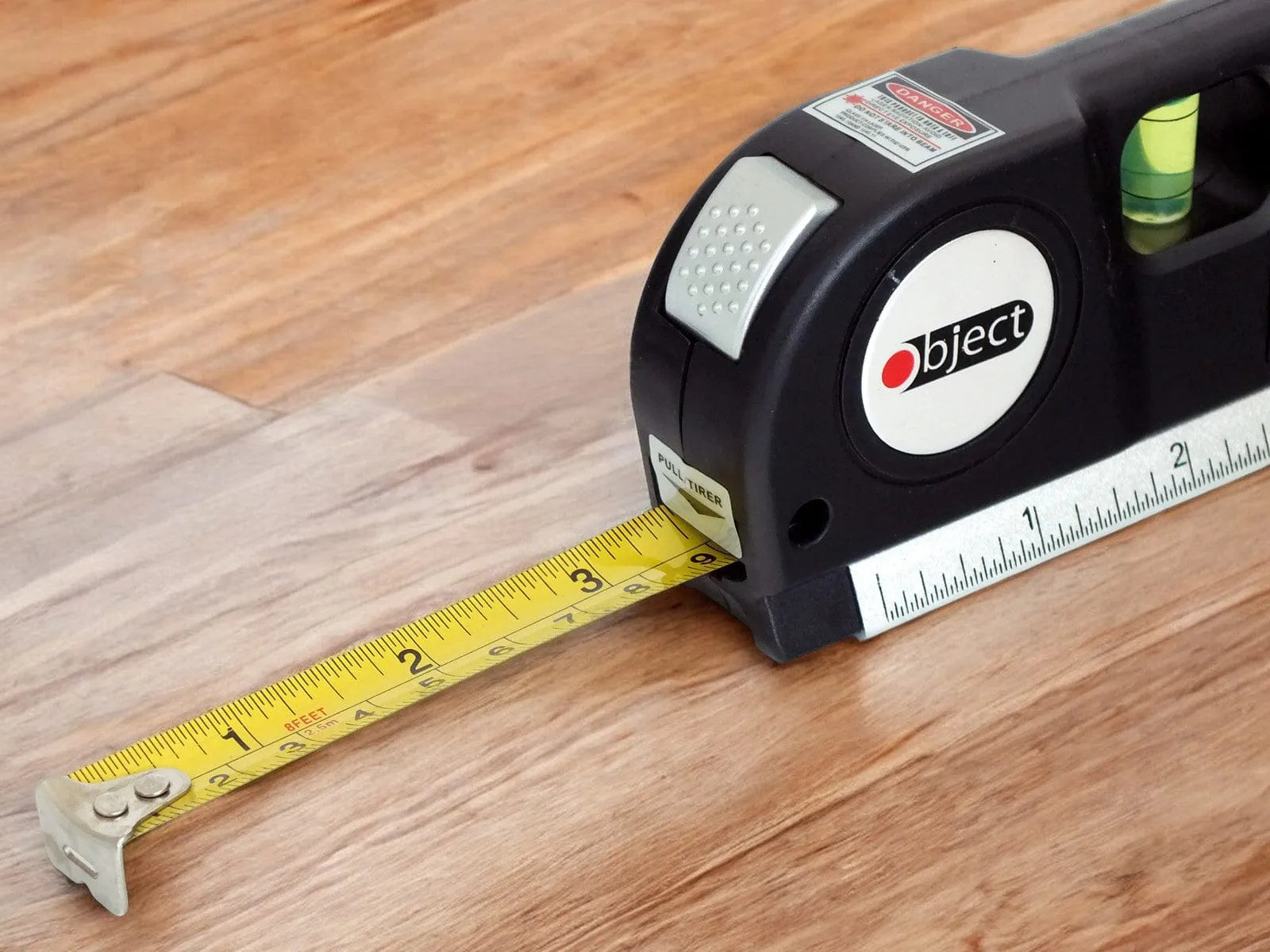 Multipurpose Laser Level with Horizontal and Vertical Spirit Levels and 14cm Measuring Tape